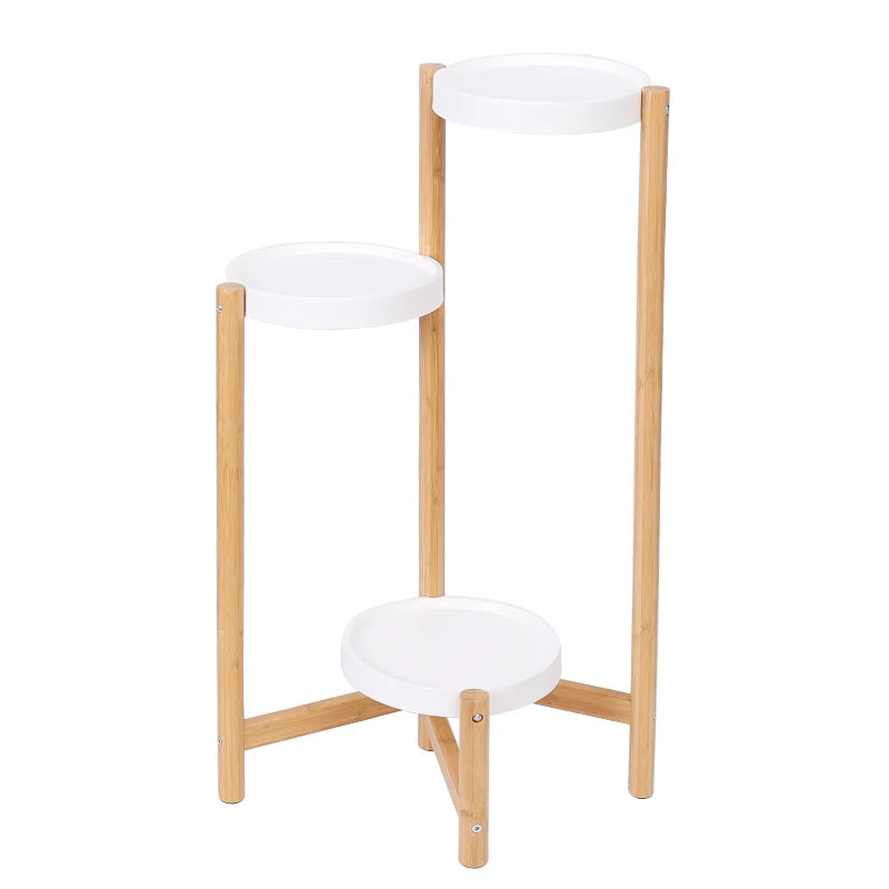 Three-tier bamboo plant stand in a white background