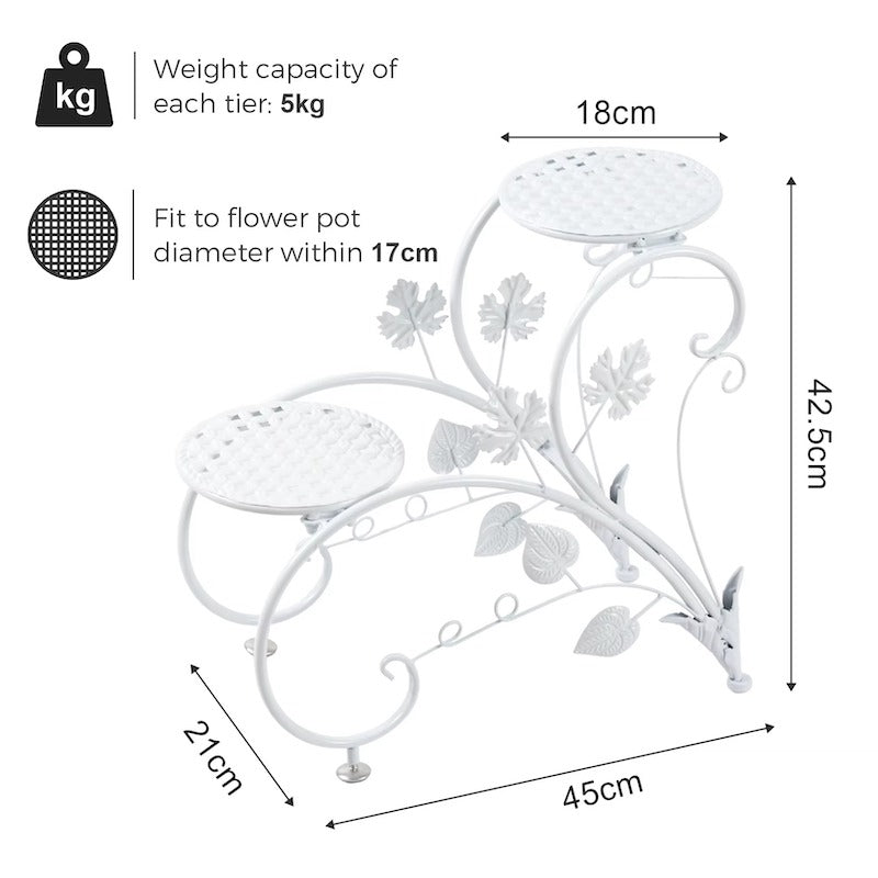 White metal two-tier garden planter stand with decorative leaf and vine motifs, shown with dimension labels (45cm, 21cm, 18cm, 42.5cm) and weight capacity text on a white background.